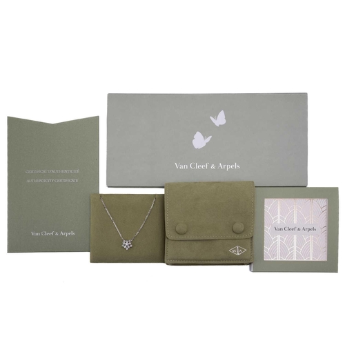 97 - Van Cleef & Arpels - a diamond-set lotus openwork pendant on chain, mini model, flowerhead motif set... 