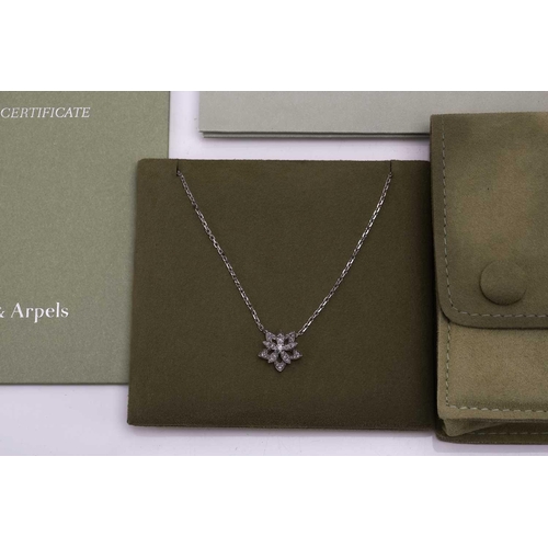 97 - Van Cleef & Arpels - a diamond-set lotus openwork pendant on chain, mini model, flowerhead motif set... 