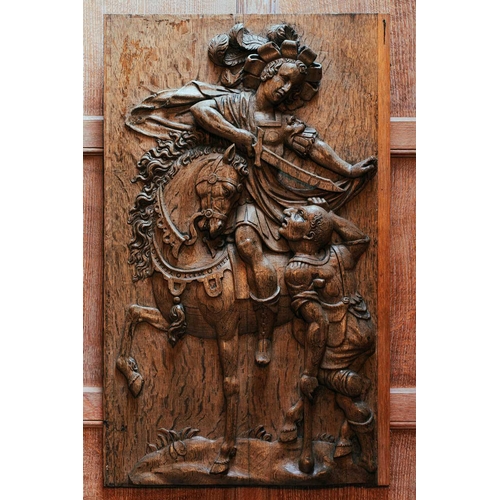 1 - A 17th-century carved-wood figure group, depicting Saint Martin of Tours on horseback dividing his c... 