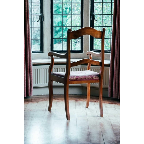 105 - A French fruitwood single carver chair, 104 cm high x 53 cm wide, together with six conforming dinin... 