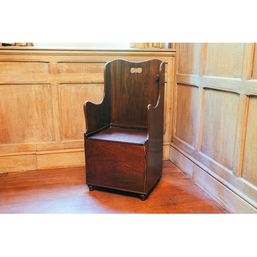 13 - An early 19th century mahogany child's lambing chair, 79 cm high x 39 cm wide. Provenance: The conte... 