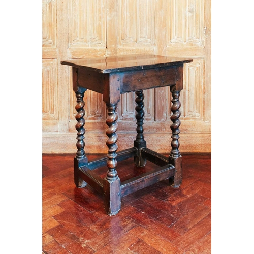 149 - A pair of 19th-century vernacular fruitwood four-legged stools with pierced rectangular- saddle seat... 