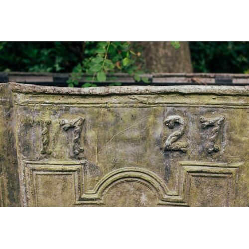 157 - An early 18th century very large lead rectangular cistern, of shaped form with embossed decoration a... 