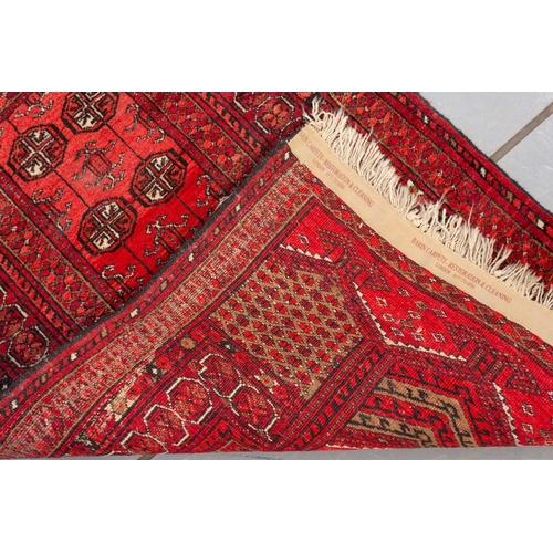 160 - An 'old country house' madder red Afghan prayer rug,110 cm x 83 cm, together with other Turkoman rug... 