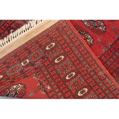 160 - An 'old country house' madder red Afghan prayer rug,110 cm x 83 cm, together with other Turkoman rug... 