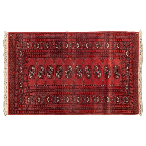 160 - An 'old country house' madder red Afghan prayer rug,110 cm x 83 cm, together with other Turkoman rug... 