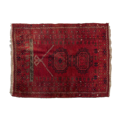 160 - An 'old country house' madder red Afghan prayer rug,110 cm x 83 cm, together with other Turkoman rug... 