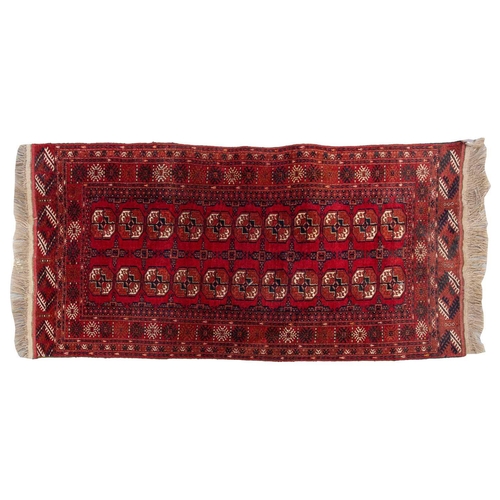 160 - An 'old country house' madder red Afghan prayer rug,110 cm x 83 cm, together with other Turkoman rug... 