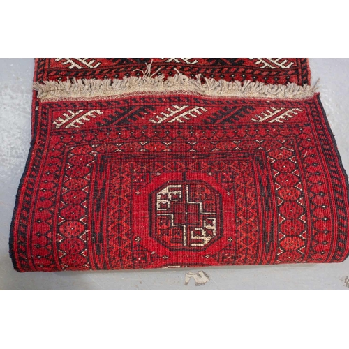 160 - An 'old country house' madder red Afghan prayer rug,110 cm x 83 cm, together with other Turkoman rug... 