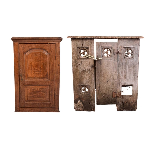 169 - A 19th century oak hanging cupboard, with twin panelled door enclosing shelves, 66 cm wide, 103 cm h... 