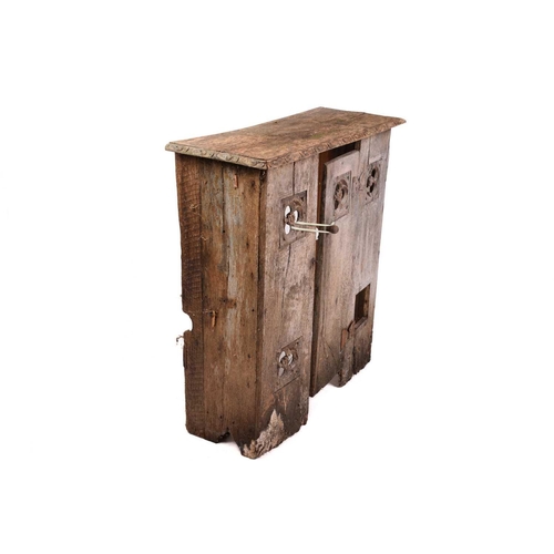 169 - A 19th century oak hanging cupboard, with twin panelled door enclosing shelves, 66 cm wide, 103 cm h... 