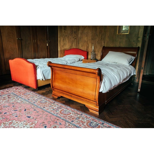 172 - A pair of 'And So To Bed' French-style cherrywood single sleigh beds with scroll ends and sprung sla... 