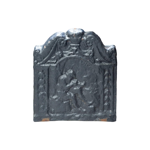 177 - A small cast iron fire back, possibly 18th century, the swan-neck top over a panel depicting a seate... 