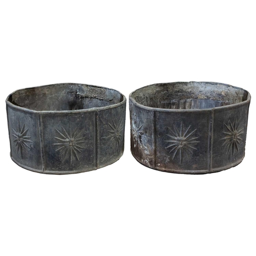 184 - A pair of George III style cylindrical lead planters, 20th century, the panelled sides with sunburst... 