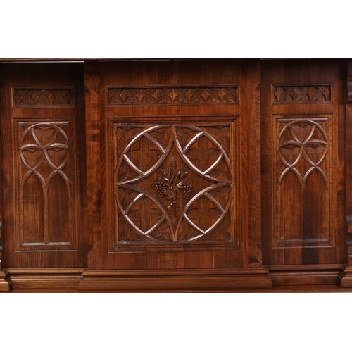 195 - A Gothic style walnut altar, by Laboratorio Gruppo Liturgico, San Damiano D'Asti, with breakfront ba... 