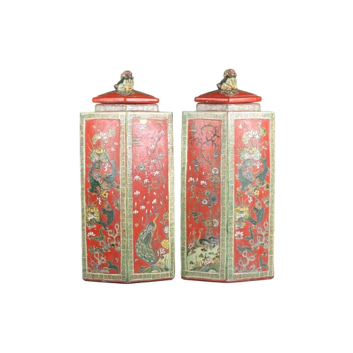 248 - A large pair of Chinese Famile Vert, lozenge section vases and covers, 20th century, each with lion ... 