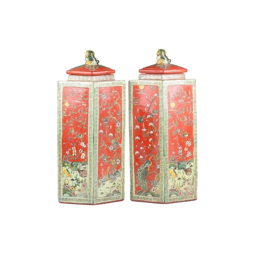 248 - A large pair of Chinese Famile Vert, lozenge section vases and covers, 20th century, each with lion ... 