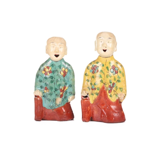 250 - Two similar Chinese porcelain 'Laughing Boy' incense burner figures, late Qing /Republic era, each f... 