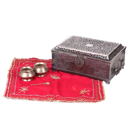 255 - An Indo-Persian rectangular silver betel nut leaf table box, late 19th century, with a hinged caddy ... 