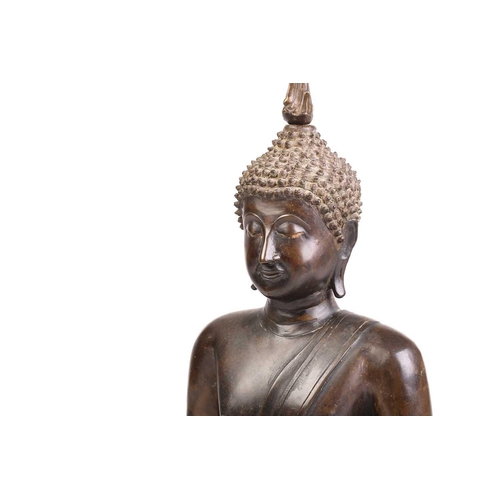 257 - A large bronze Theravada Buddha seated in Bhumisparsha mudra, 18th century, with lotus flame ushnish... 