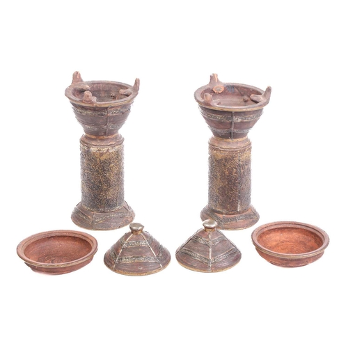 259 - Two vintage pottery standing tagine pots, with applied metal covers and cylindrical stands for ember... 