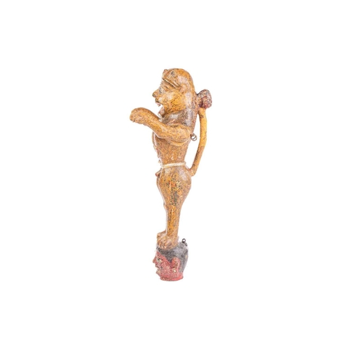 263 - An Indian painted and carved wood figure of a crowned tiger, standing on his hind legs with arms out... 