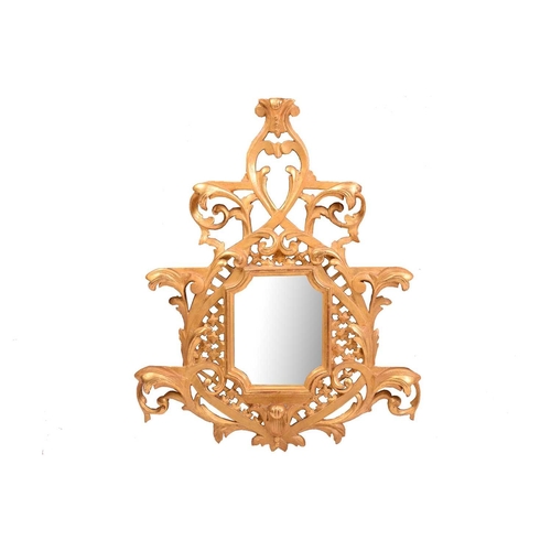 277 - A pair of George II style giltwood wall mirrors, the rectangular plates with concave corners within ... 