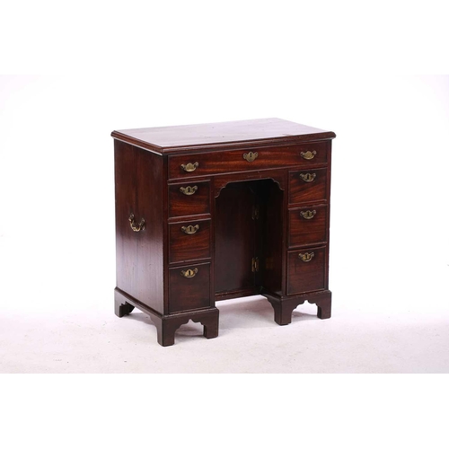 280 - An 18th-century mahogany knee-hole writing desk fitted with a central frieze drawer above a further ... 