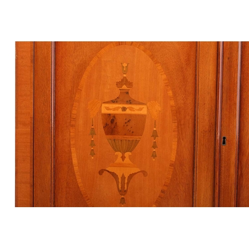 286 - A reproduction George III style mahogany side cabinet, the pierced brass half gallery over a pair of... 