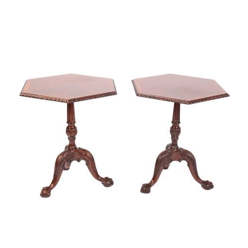 292 - A pair of George III style carved mahogany hexagonal pillar tables, 20th century, with crossbanded a... 