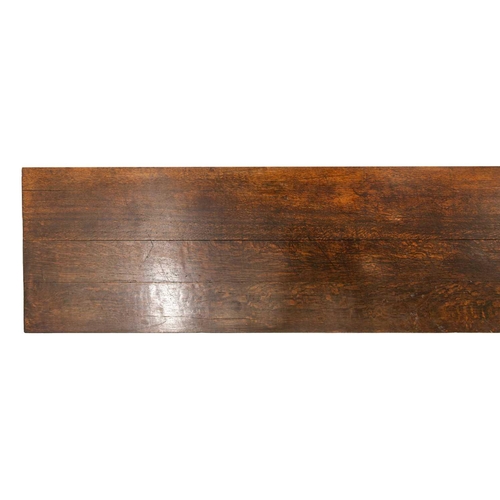 293 - A large 18th-century-style rectangular oak library directory table, with a planked top with moulded ... 