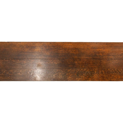 293 - A large 18th-century-style rectangular oak library directory table, with a planked top with moulded ... 