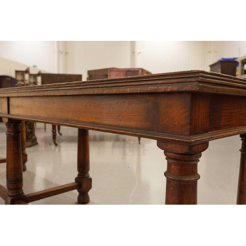 293 - A large 18th-century-style rectangular oak library directory table, with a planked top with moulded ... 