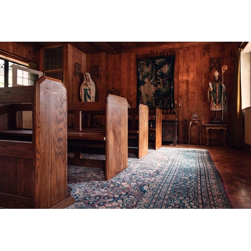 30 - Three stained oak church pews, 20th century, each 85 cm high x 180 cm wide, together with cushioned ... 