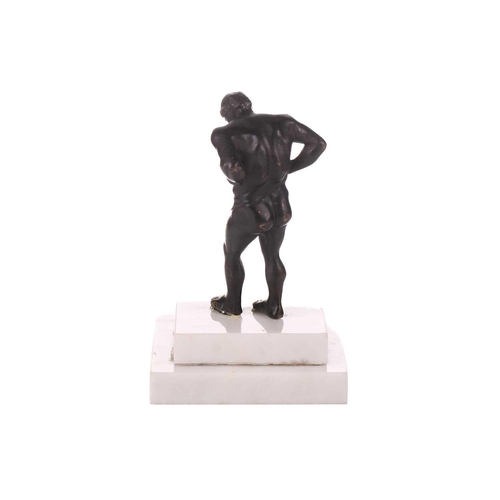 315 - A patinated bronze figure of Atlas, first half of the 19th century, on a later stepped marble base, ... 