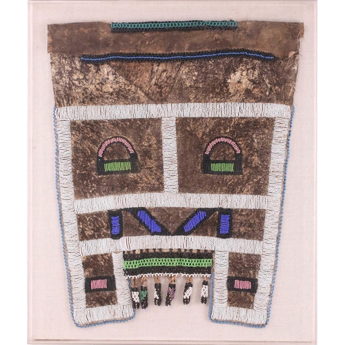 316 - Three Ndebele tribal beadwork panels attached to a canvas and encased in a perspex-boxed frame, the ... 