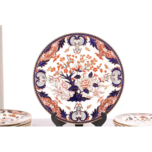 326 - A large collection of Royal Crown Derby 'Old Imari' items, to include plates, cups and saucers, milk... 