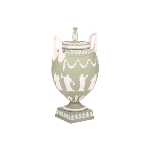 328 - A Wedgwood sage green jasperware ovoid vase urn and cover, mid to late 20th century, with two high l... 