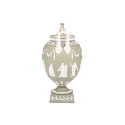 328 - A Wedgwood sage green jasperware ovoid vase urn and cover, mid to late 20th century, with two high l... 