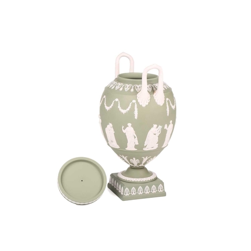 328 - A Wedgwood sage green jasperware ovoid vase urn and cover, mid to late 20th century, with two high l... 