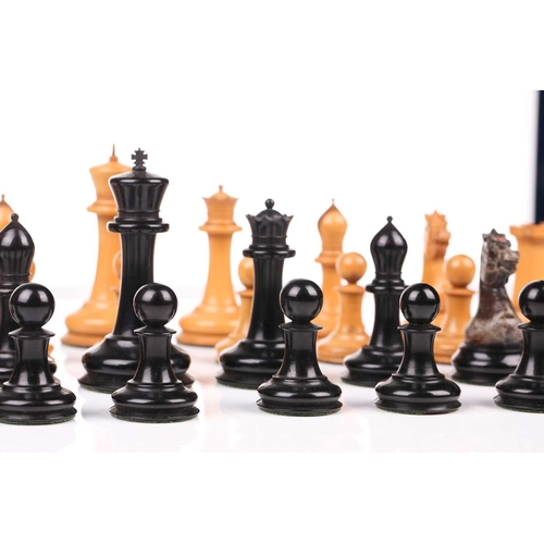 347 - Jacques, London: a 'Staunton Chess Men' boxwood and ebony chess set, mid-19th century, contained in ... 