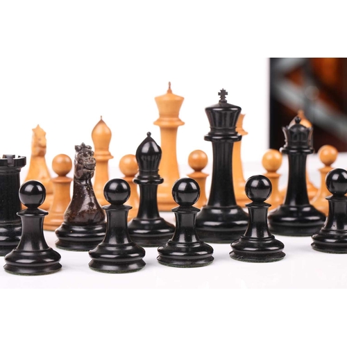 347 - Jacques, London: a 'Staunton Chess Men' boxwood and ebony chess set, mid-19th century, contained in ... 