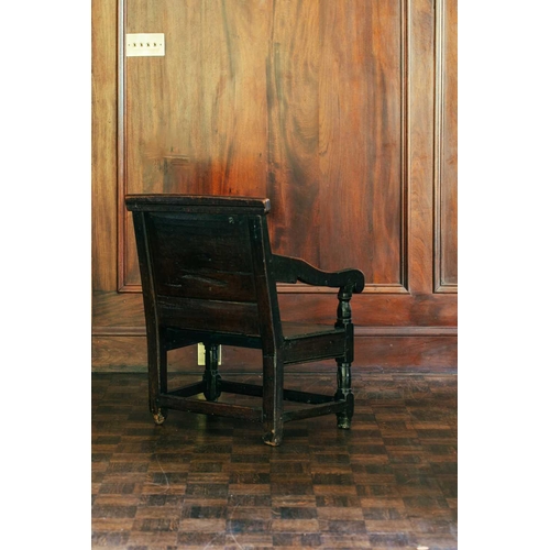 40 - A 17th-century oak wainscot chair, with lozenge carved panel back, of low and wide proportions, 75 c... 