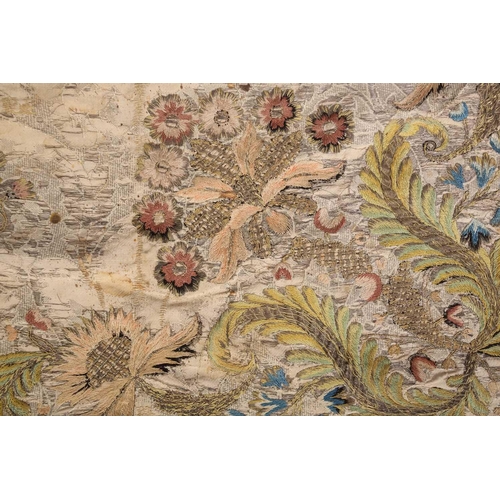 52 - A group of silk worked panels including a possibly century silk altar cloth/wall hanging with floral... 