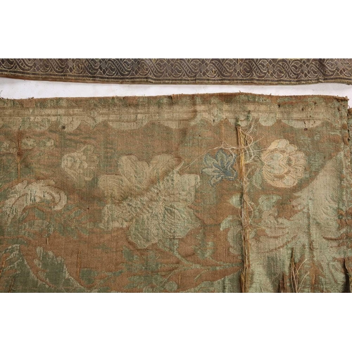 52 - A group of silk worked panels including a possibly century silk altar cloth/wall hanging with floral... 