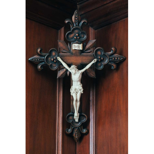 55 - An early 20th century French bisque porcelain and carved oak crucifix, 47 x 67cm, together with a ca... 