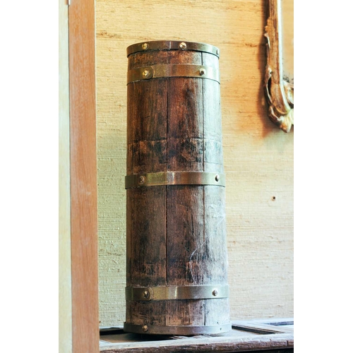 7 - A coopered oak and brass umbrella stand, 58c m high, together with an Italian Baroque giltwood wall ... 