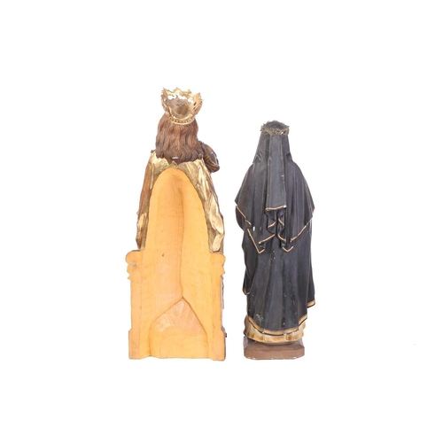 95 - A 20th century carved and painted softwood religious figure of The Holy Father holding up his crucif... 