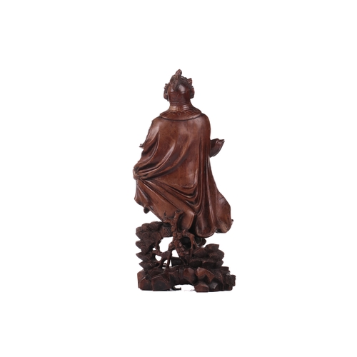 254A - A Chinese carved cherrywood figure of Guan Gong (The God Of War) , 19th/20th century carved in the r... 