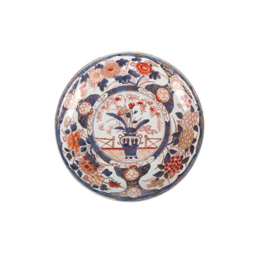 112 - A Japanese Imari porcelain circular dish, Edo period,1st quarter of the 19th century, painted in the... 